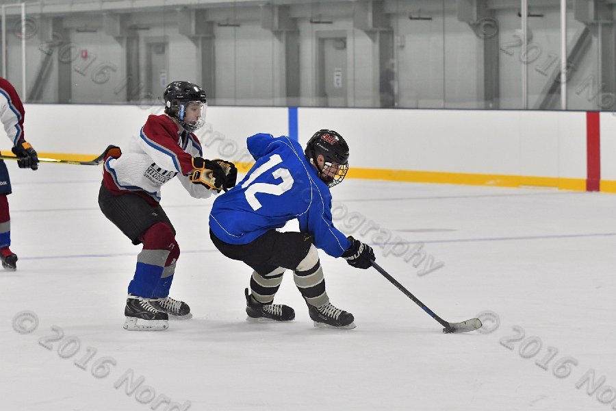 Wheaton College Men\'s Ice Hockey vs Middlesex Community College. - Photo By: KEITH NORDSTROM